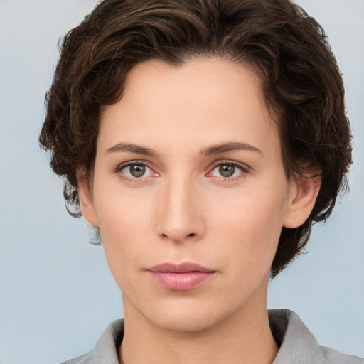 Neutral white young-adult female with short  brown hair and brown eyes