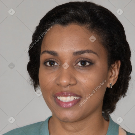 Joyful black young-adult female with medium  black hair and brown eyes