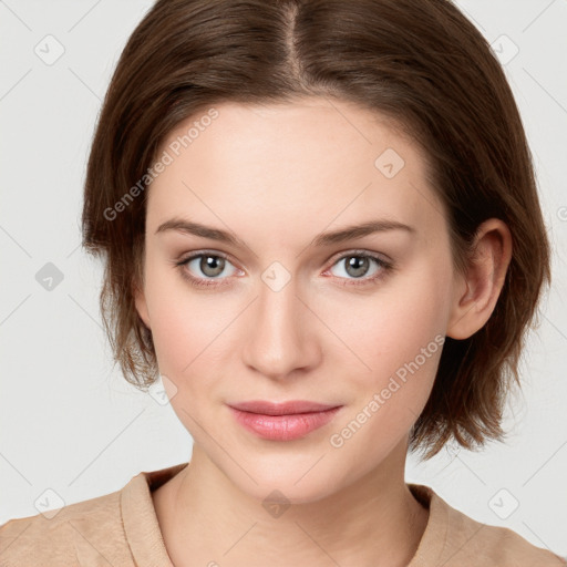 Joyful white young-adult female with medium  brown hair and green eyes