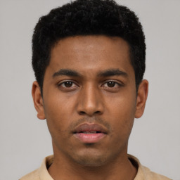 Neutral black young-adult male with short  black hair and brown eyes