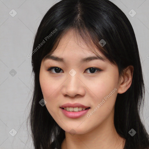 Joyful asian young-adult female with medium  black hair and brown eyes