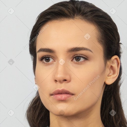 Neutral white young-adult female with long  brown hair and brown eyes