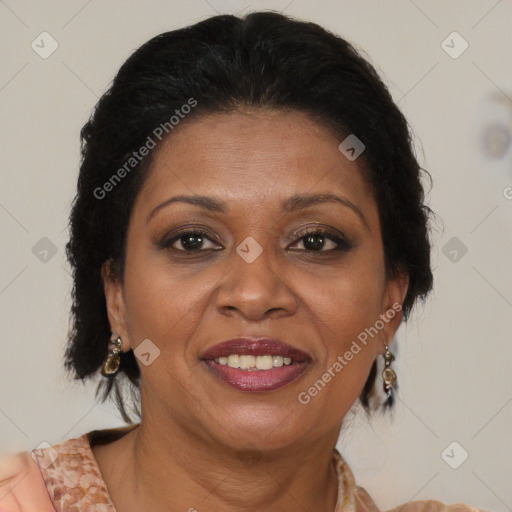 Joyful black adult female with medium  brown hair and brown eyes