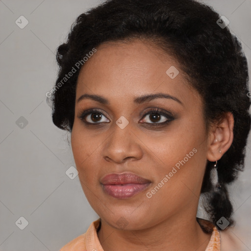 Joyful black young-adult female with medium  brown hair and brown eyes