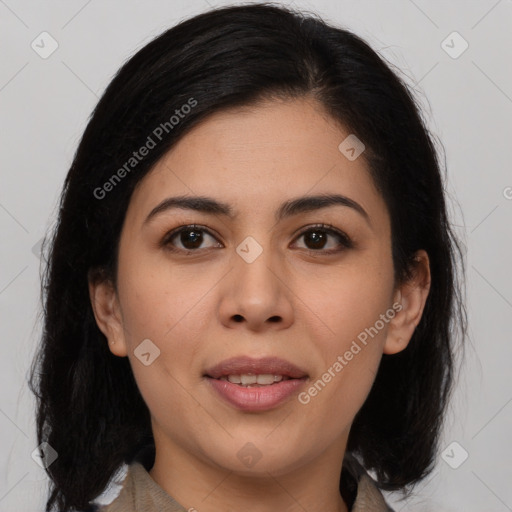 Joyful latino young-adult female with medium  brown hair and brown eyes