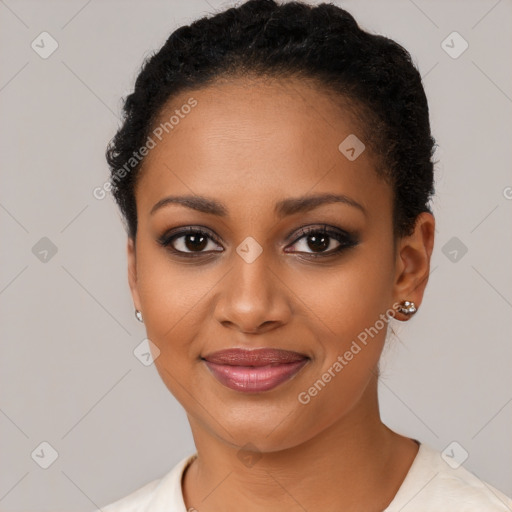 Joyful black young-adult female with short  brown hair and brown eyes