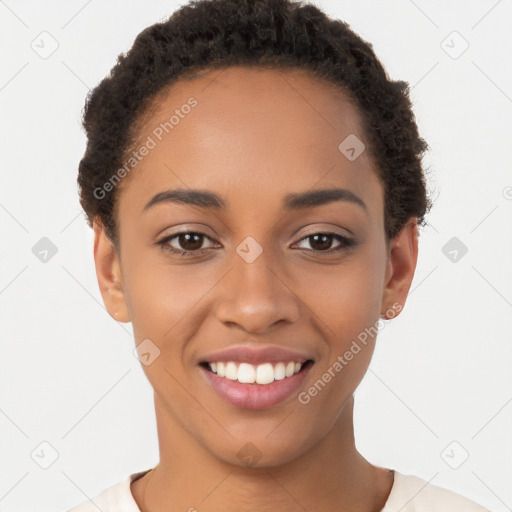 Joyful latino young-adult female with short  brown hair and brown eyes