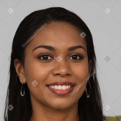 Joyful latino young-adult female with long  brown hair and brown eyes