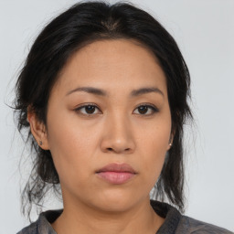 Neutral asian young-adult female with medium  black hair and brown eyes