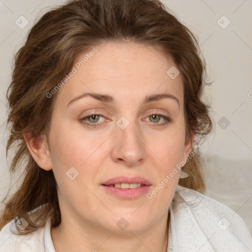 Joyful white adult female with medium  brown hair and green eyes