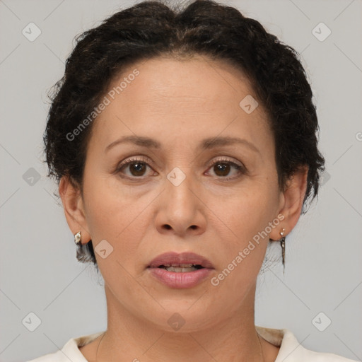 Joyful white adult female with short  brown hair and brown eyes