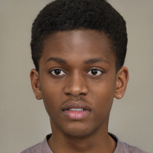 Neutral black child male with short  brown hair and brown eyes