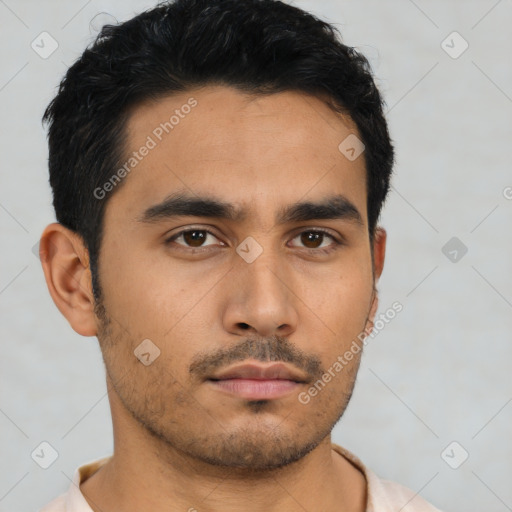 Neutral latino young-adult male with short  black hair and brown eyes