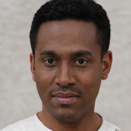 Neutral black young-adult male with short  black hair and brown eyes
