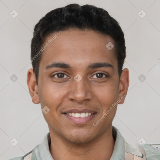 Joyful latino young-adult male with short  brown hair and brown eyes