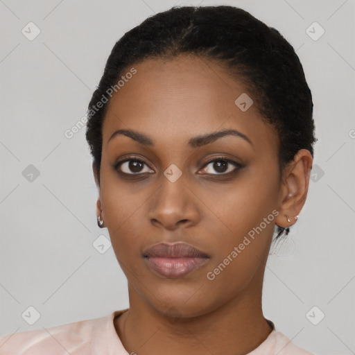 Neutral black young-adult female with short  black hair and brown eyes