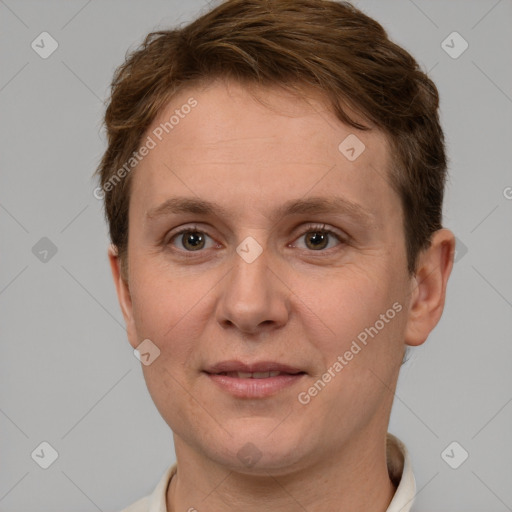 Joyful white adult female with short  brown hair and brown eyes