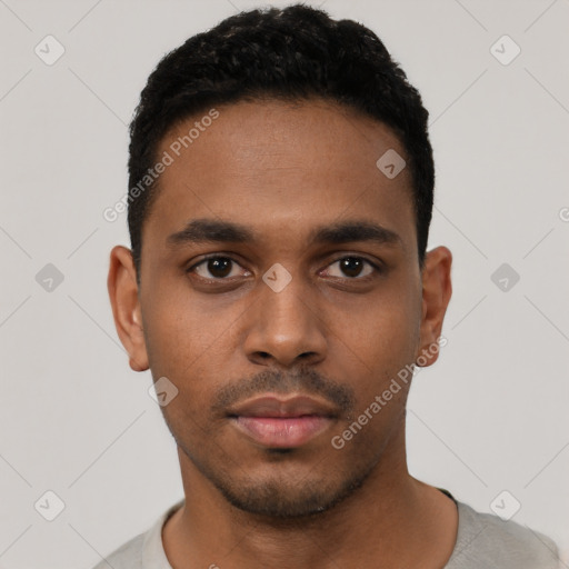 Neutral latino young-adult male with short  black hair and brown eyes