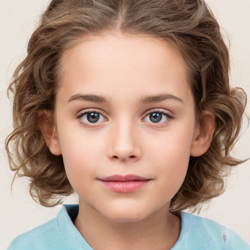 Joyful white child female with medium  brown hair and brown eyes