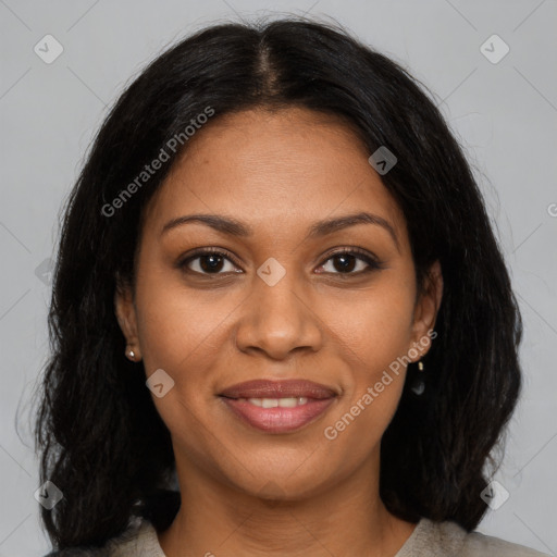 Joyful black young-adult female with medium  brown hair and brown eyes