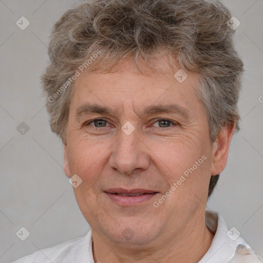 Joyful white middle-aged male with short  brown hair and brown eyes