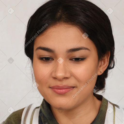 Joyful latino young-adult female with medium  brown hair and brown eyes