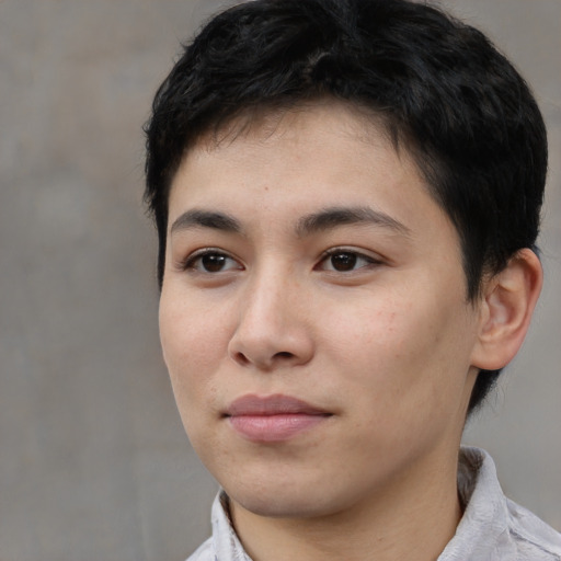 Joyful white young-adult female with short  black hair and brown eyes