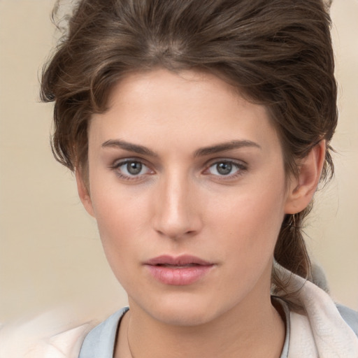 Neutral white young-adult female with short  brown hair and brown eyes