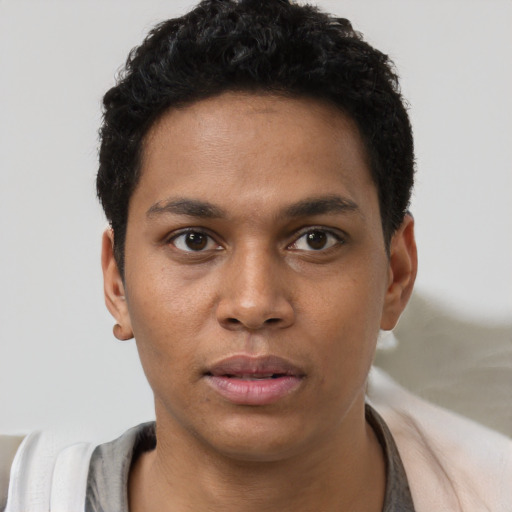 Neutral latino young-adult male with short  brown hair and brown eyes