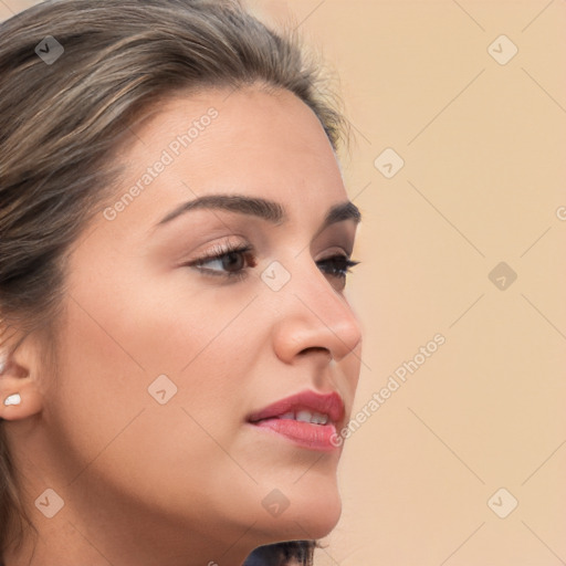 Neutral white young-adult female with long  brown hair and brown eyes