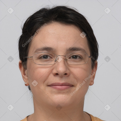 Joyful white adult female with short  brown hair and brown eyes