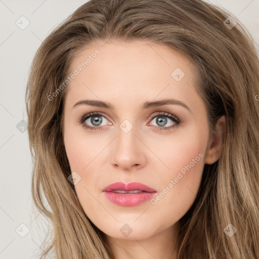 Joyful white young-adult female with long  brown hair and green eyes