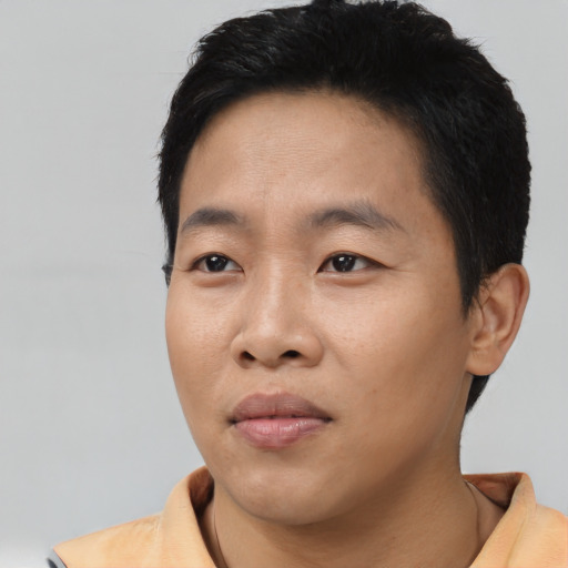 Neutral asian young-adult male with short  black hair and brown eyes