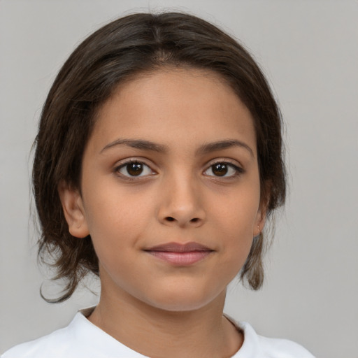 Joyful white child female with medium  brown hair and brown eyes