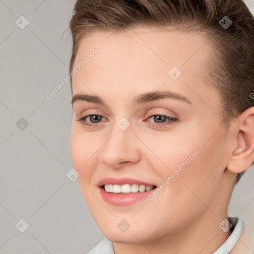 Joyful white young-adult female with short  brown hair and brown eyes