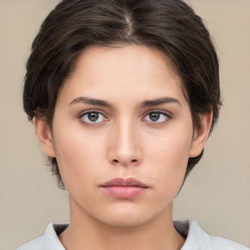 Neutral white young-adult female with medium  brown hair and brown eyes