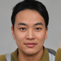 Neutral asian young-adult male with short  brown hair and brown eyes