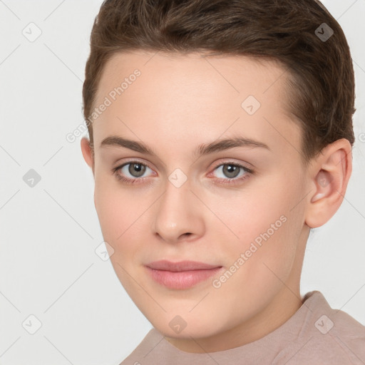 Joyful white young-adult female with short  brown hair and grey eyes