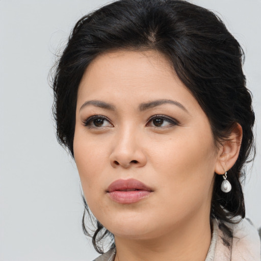 Neutral asian young-adult female with long  brown hair and brown eyes
