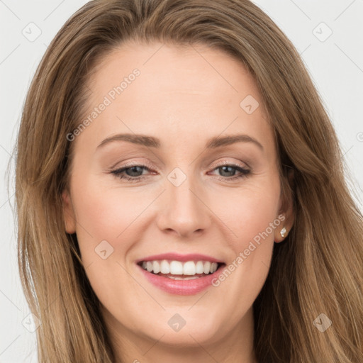 Joyful white young-adult female with long  brown hair and brown eyes