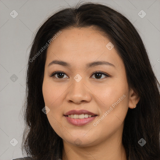 Joyful asian young-adult female with long  brown hair and brown eyes