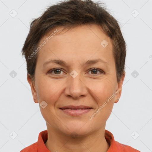 Joyful white adult female with short  brown hair and brown eyes