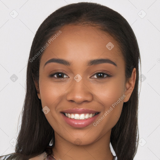 Joyful latino young-adult female with long  brown hair and brown eyes