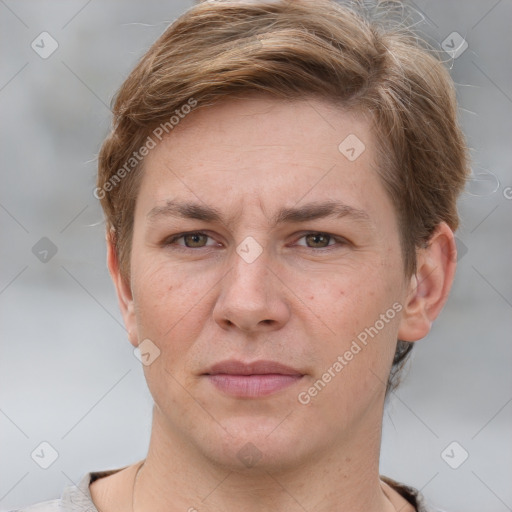 Joyful white adult female with short  brown hair and grey eyes