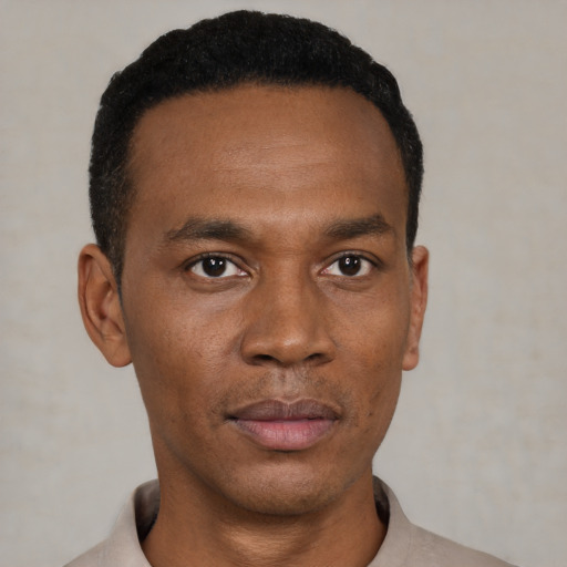 Neutral black young-adult male with short  black hair and brown eyes