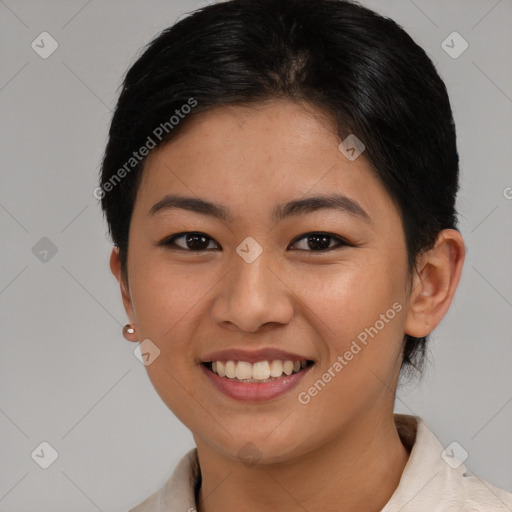 Joyful asian young-adult female with medium  brown hair and brown eyes