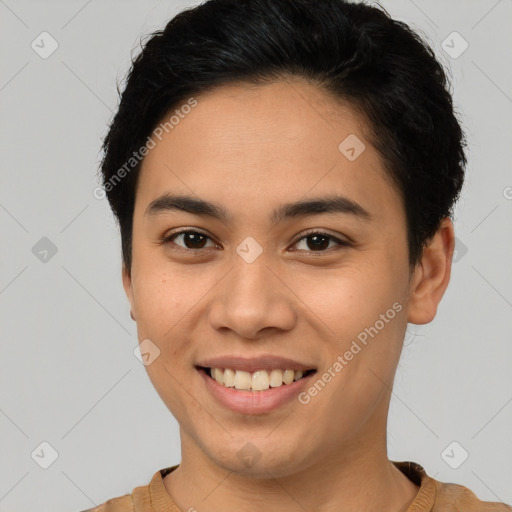 Joyful latino young-adult female with short  brown hair and brown eyes