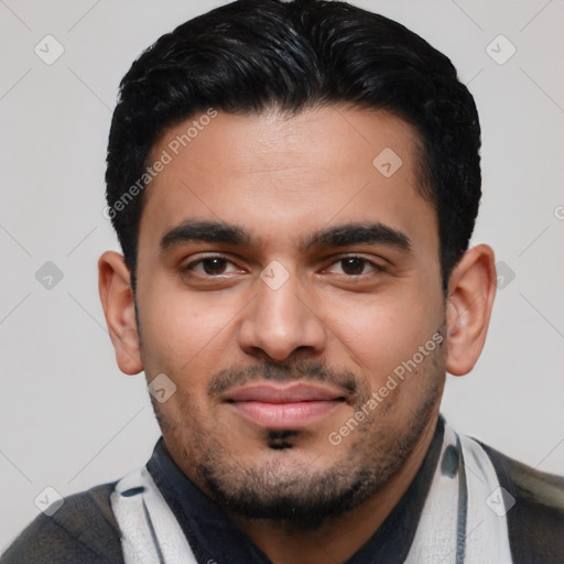 Joyful latino young-adult male with short  black hair and brown eyes