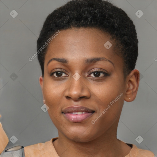 Joyful black young-adult female with short  brown hair and brown eyes