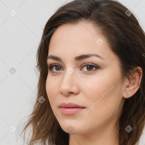 Neutral white young-adult female with long  brown hair and brown eyes